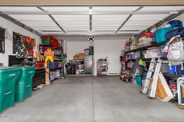 garage featuring a garage door opener