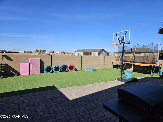 view of patio with a trampoline