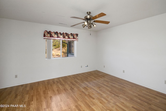 15015 E White Dr, Dewey-Humboldt, AZ 86327 - empty room with light wood-type flooring, ceiling fan, and baseboards