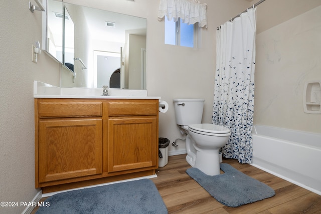 15015 E White Dr, Dewey-Humboldt, AZ 86327 - full bath featuring toilet, vanity, shower / tub combo, and wood finished floors