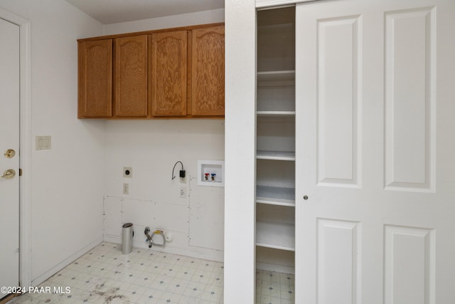 15015 E White Dr, Dewey-Humboldt, AZ 86327 - laundry room with hookup for an electric dryer, cabinet space, light flooring, and hookup for a washing machine
