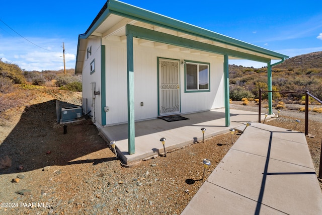 15015 E White Dr, Dewey-Humboldt, AZ 86327 - view of home's exterior with a patio and a mountain view