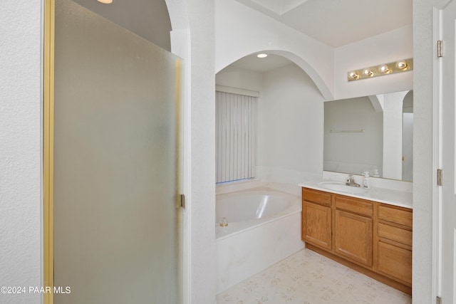 15015 E White Dr, Dewey-Humboldt, AZ 86327 - bathroom with vanity, a garden tub, and a stall shower