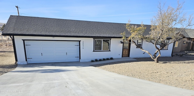 ranch-style house featuring a garage