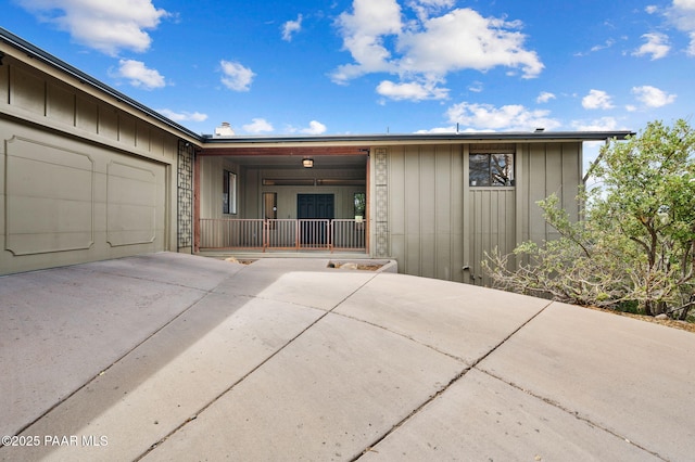2008 Forest Hills Rd, Prescott, AZ 86303 - ranch-style house featuring driveway, a garage, and board and batten siding
