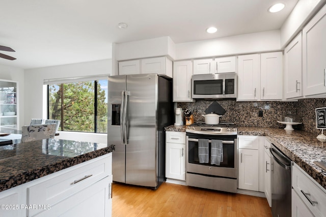 2008 Forest Hills Rd, Prescott, AZ 86303 - kitchen featuring stainless steel appliances, tasteful backsplash, white cabinets, ceiling fan, and recessed lighting