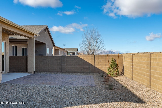 view of yard with a patio area