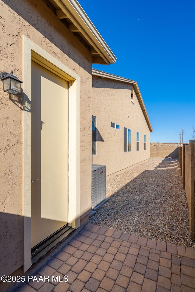 view of patio featuring cooling unit