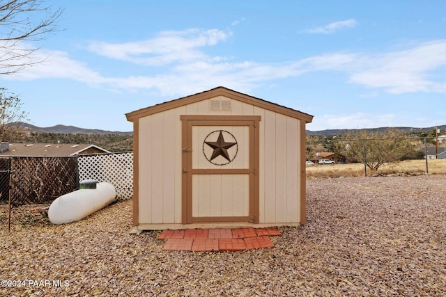 view of outdoor structure with a mountain view