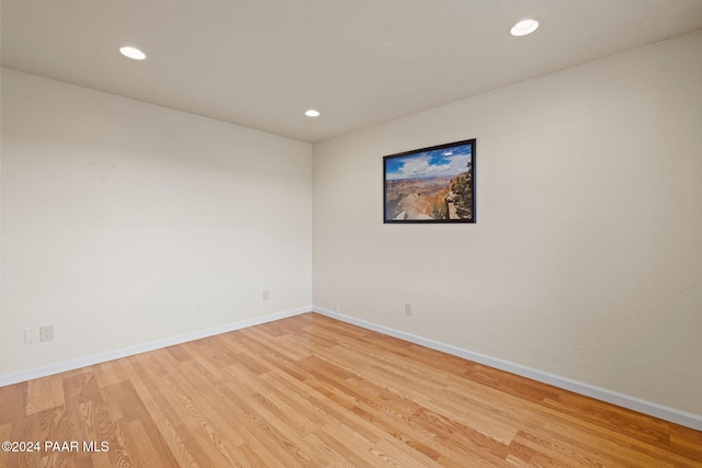 unfurnished room featuring light hardwood / wood-style floors