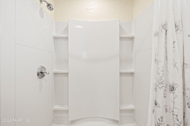 bathroom featuring walk in shower