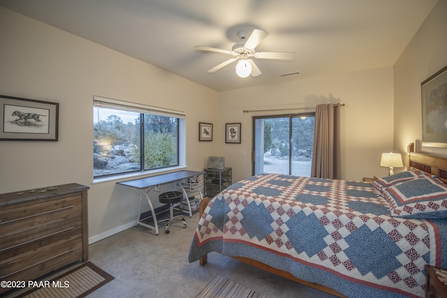 carpeted bedroom featuring baseboards, visible vents, access to outside, and ceiling fan