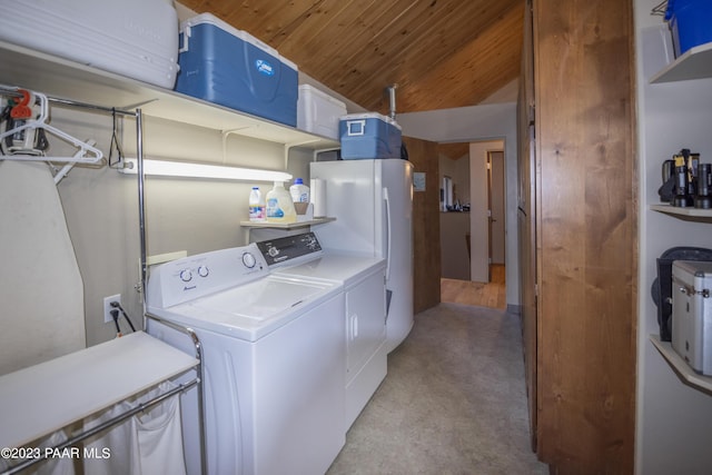 washroom with washing machine and dryer, light carpet, laundry area, and wood ceiling