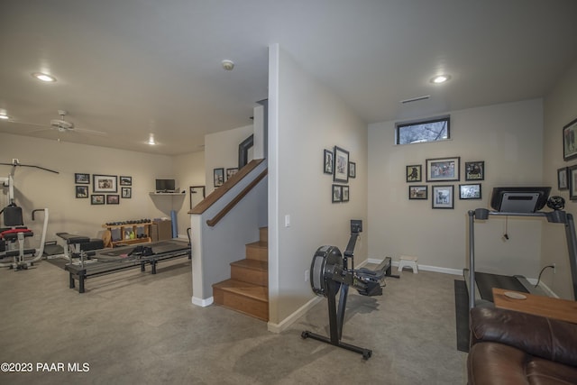 exercise area featuring baseboards, recessed lighting, and carpet floors
