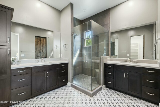 bathroom featuring vanity, wood-type flooring, and toilet