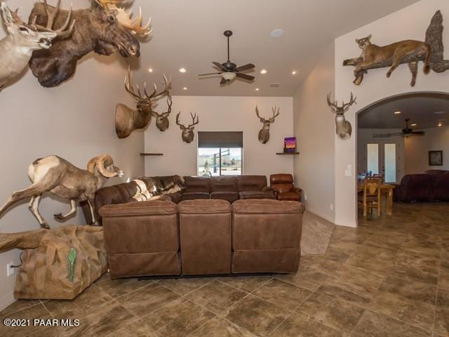 living room with ceiling fan