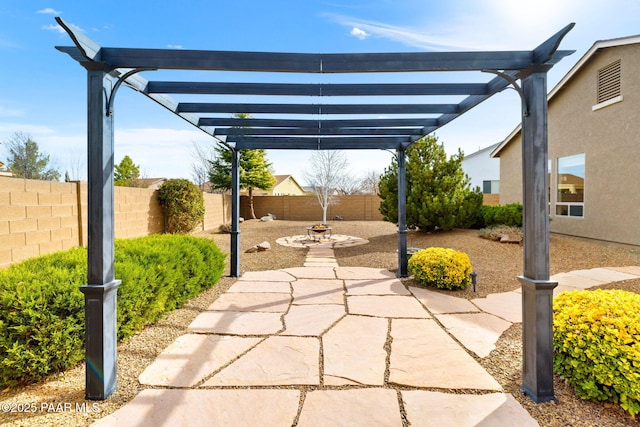 view of patio with a fenced backyard and a pergola