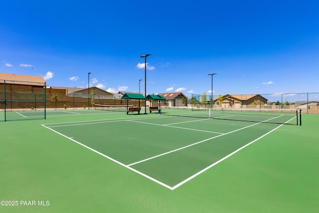 view of sport court featuring community basketball court and fence