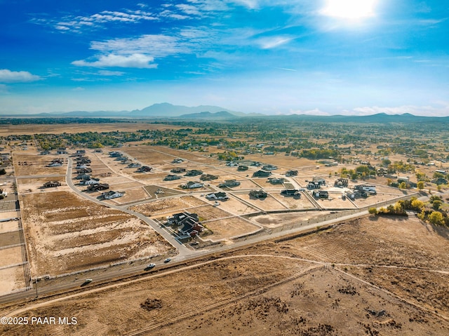 drone / aerial view featuring a mountain view