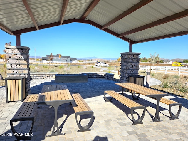 view of patio / terrace featuring a mountain view