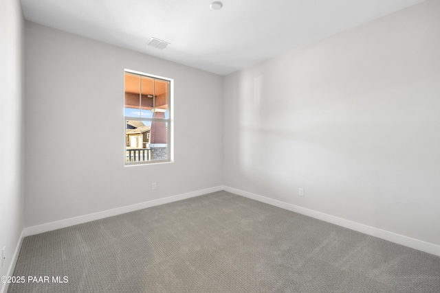 view of carpeted spare room