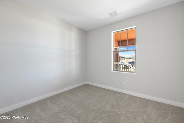 view of carpeted spare room