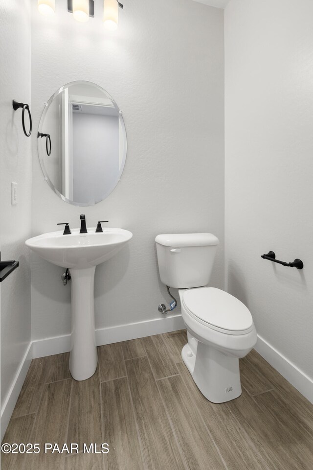 bathroom featuring toilet