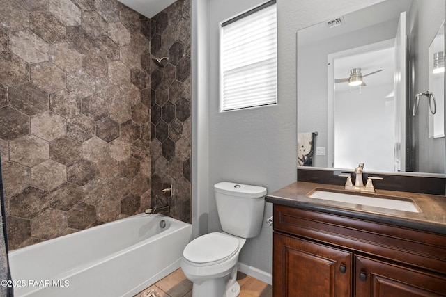 full bathroom featuring baseboards, visible vents, toilet,  shower combination, and vanity