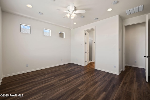 7912 Huckleberry Trl, Prescott Valley, AZ 86315 - unfurnished bedroom with dark wood-type flooring, recessed lighting, baseboards, and ceiling fan