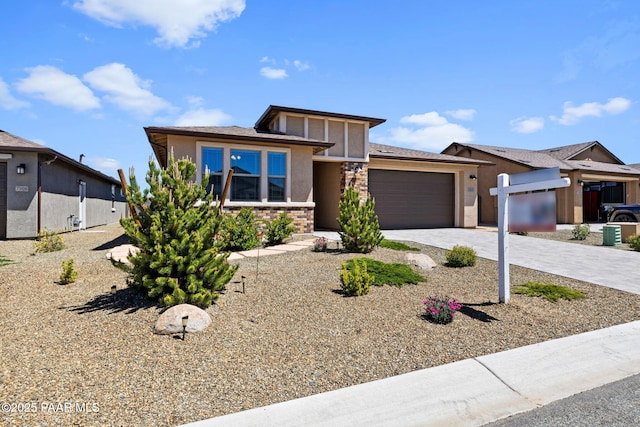 7912 Huckleberry Trl, Prescott Valley, AZ 86315 - view of front of home featuring stone siding, a garage, stucco siding, and decorative driveway