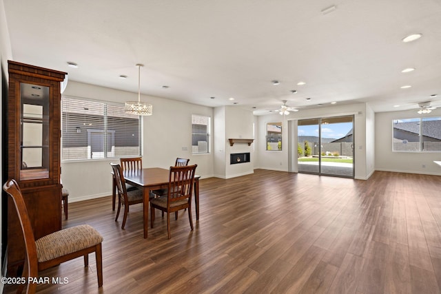 7912 Huckleberry Trl, Prescott Valley, AZ 86315 - dining space with ceiling fan, recessed lighting, dark wood-style floors, baseboards, and a chandelier