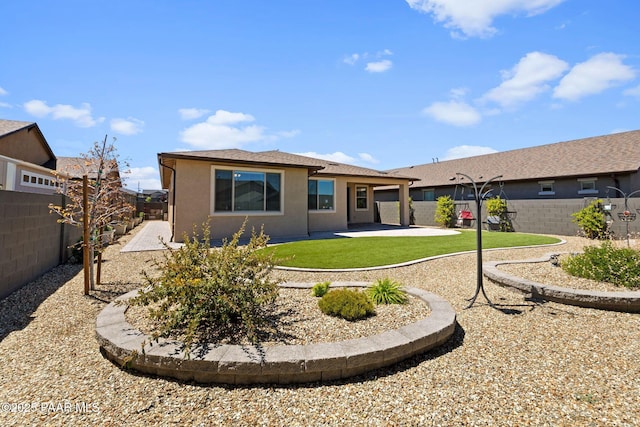7912 Huckleberry Trl, Prescott Valley, AZ 86315 - back of house with a patio area and stucco siding