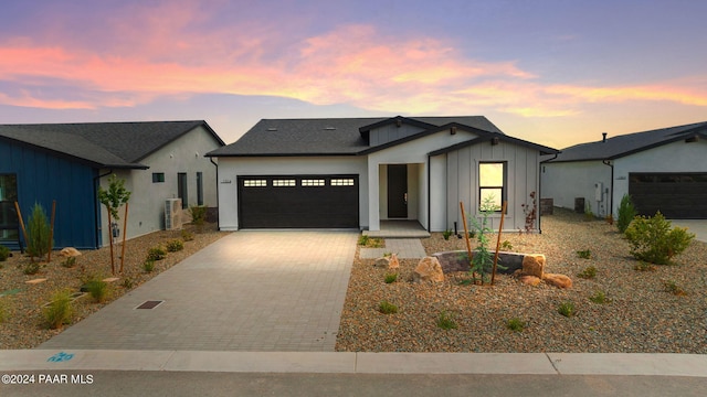 modern farmhouse featuring a garage