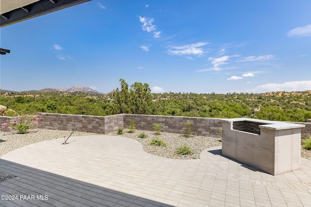 view of patio featuring a mountain view