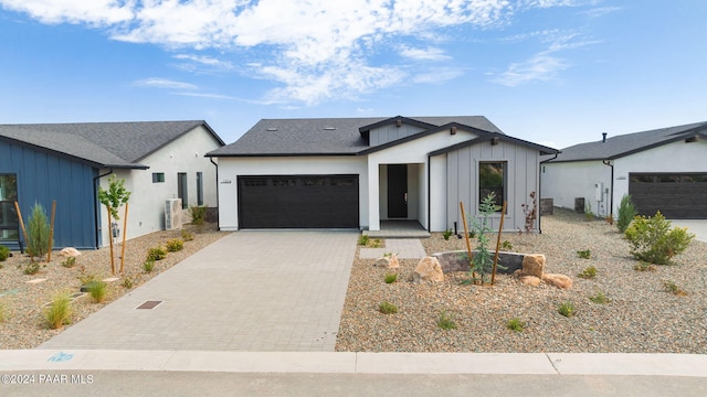 modern farmhouse with a garage