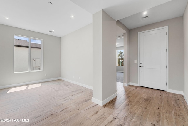 foyer entrance with light hardwood / wood-style flooring