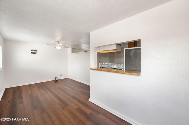 234 N Arizona Ave, Prescott, AZ 86301 - empty room with a ceiling fan, dark wood-type flooring, and baseboards