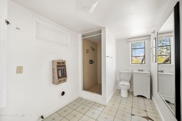 234 N Arizona Ave, Prescott, AZ 86301 - bathroom with heating unit, toilet, a shower stall, baseboards, and vanity