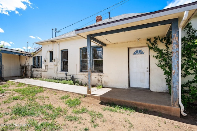 234 N Arizona Ave, Prescott, AZ 86301 - entrance to property featuring stucco siding and a chimney