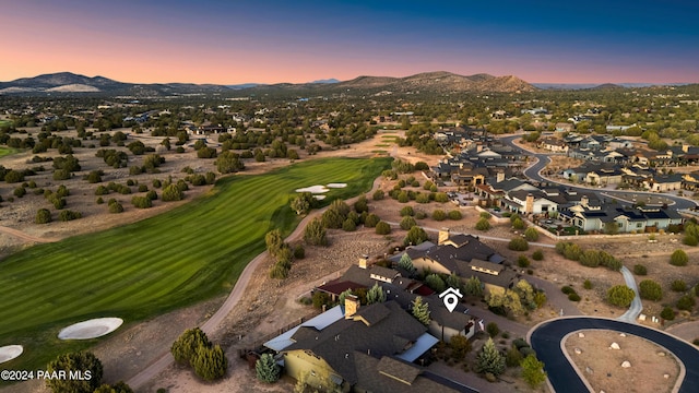 aerial view at dusk with a mountain view