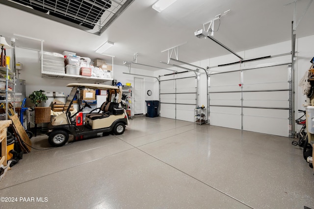 garage featuring a garage door opener