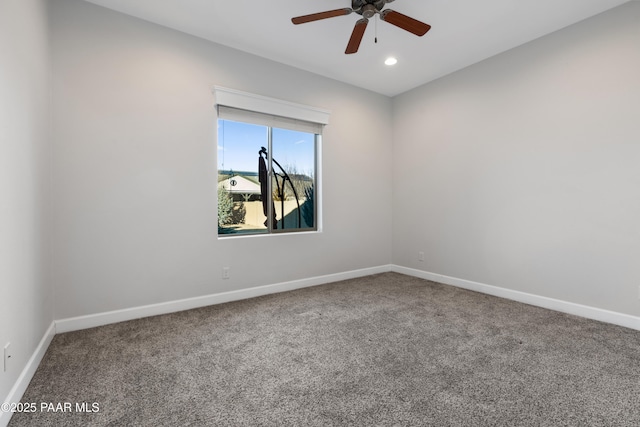 unfurnished room featuring carpet flooring and ceiling fan