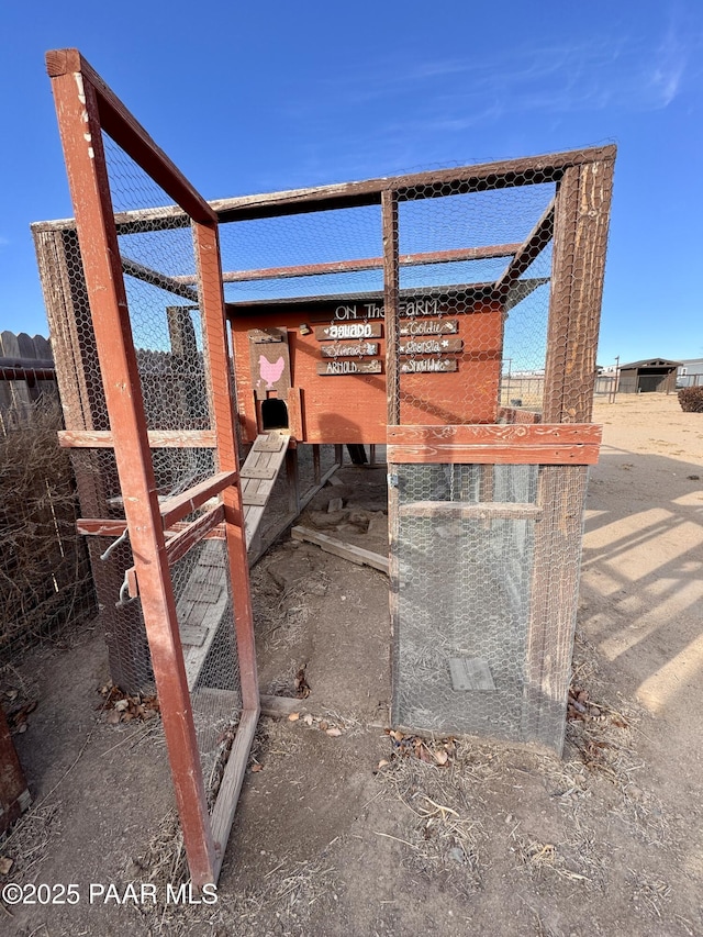 view of patio / terrace with an outbuilding