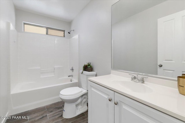 full bathroom featuring vanity, shower / bath combination, and toilet