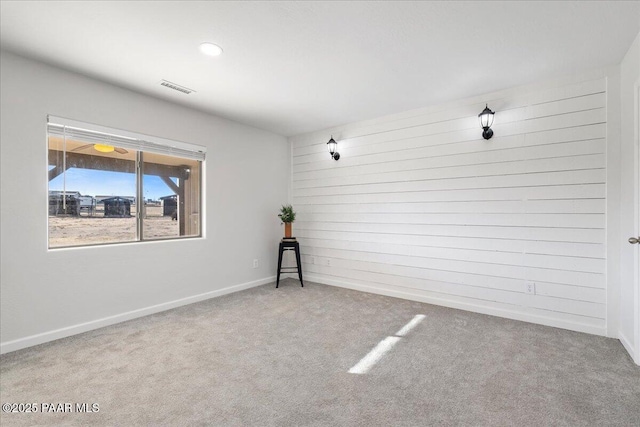 empty room featuring carpet floors