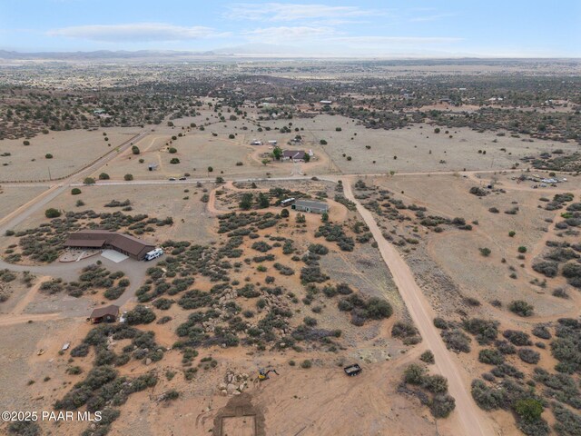 aerial view with a rural view, a desert view, and a mountain view