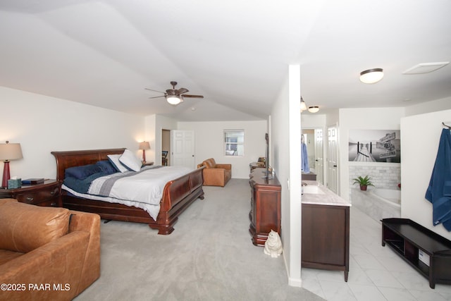 bedroom with ceiling fan and ensuite bathroom