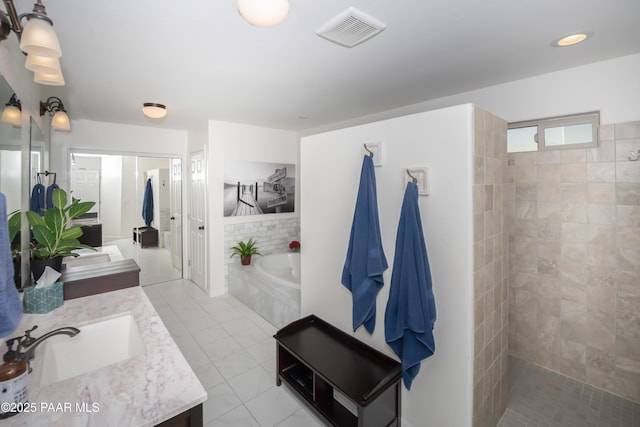 bathroom with vanity, tile patterned flooring, and separate shower and tub