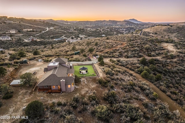 aerial view at dusk with a mountain view