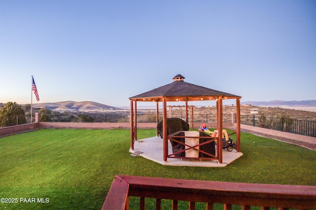 view of yard with a gazebo and a mountain view